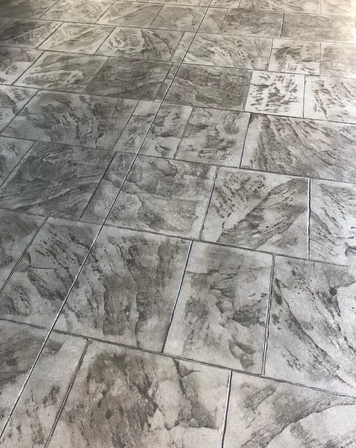 Stamped concrete in a grey slate flagstone pattern